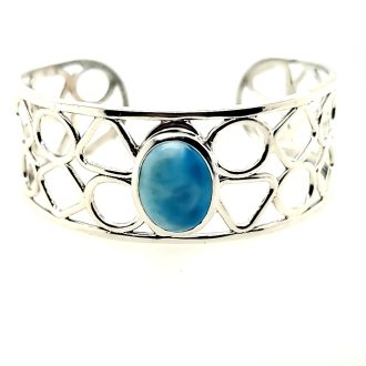 Modern and stylish sterling silver bangle with wide oval bezel featuring beautiful Larimar gemstone to make a fashionable statement.