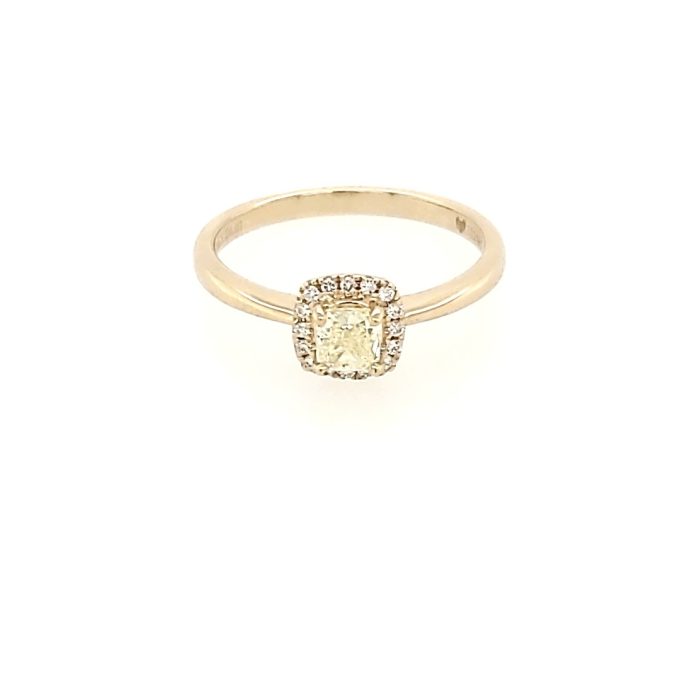 Beautiful, yellow fancy diamonds sparkle in a halo of 18K yellow gold, creating a stunning 0.44 carat ring.