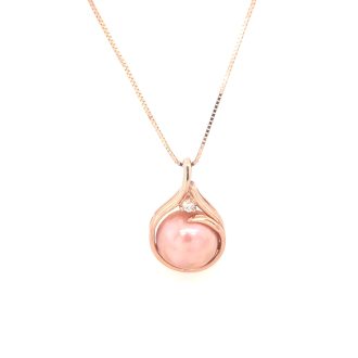 Gleaming 14K rose gold adorned with a blush pink pearl - a beautiful and timeless drop pendant total weight of .06ctw.