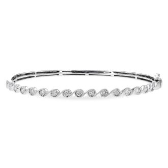 Elegant milgrain swirl bangle bracelet with 0.32ctw of 14k white gold. Perfect for any special occasion!