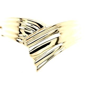 14k yellow gold bangle bracelet featuring alluring Limoges design and graceful wide bypass shape.