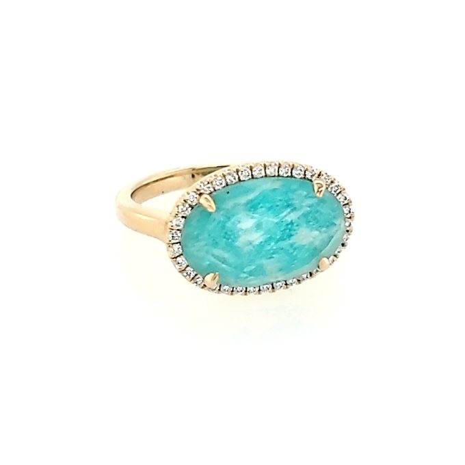 Beautiful, 18K yellow gold halo ring featuring a 0.18ctw oval Amazonite gemstone. Graceful and fashionable.