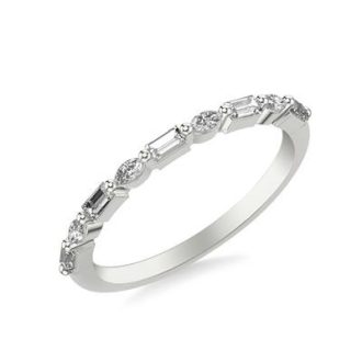 This 14K White gold stackable pattern band is a stylish addition to any jewelry collection. Its sophisticated pattern creates the perfect balance of sophistication and contemporary looks. With 0.31 Carat Total Weight of diamond accents, this band creates a magnificent and bold statement. Wear alone or stacked with other bands, this is the perfect way to express your style.