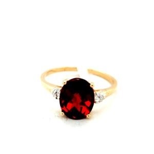 Fashion Ring with Oval Garnet and .01ctw Round Diamonds in 10k Yellow Gold