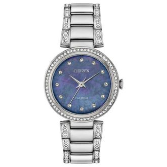 Gaze upon an elegantly designed women's timepiece with a breathtaking blue dial, highlighted by a distinct bezel inlaid with shimmering crystals. This modern wristwatch accentuated with a durable stainless steel bracelet, engineered to ensure longevity and mark its timeless aesthetic. An absolute essential for the contemporary, chic style enthusiast, extraordinarily produced by Citizen.