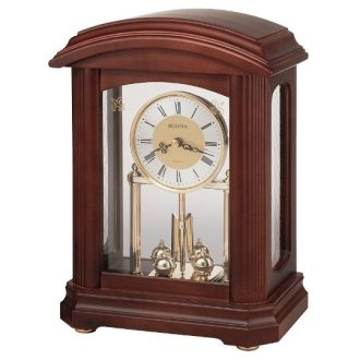 Bulova Mantel Clock Walnut Finish Revolving Pendulum Glass Encased
