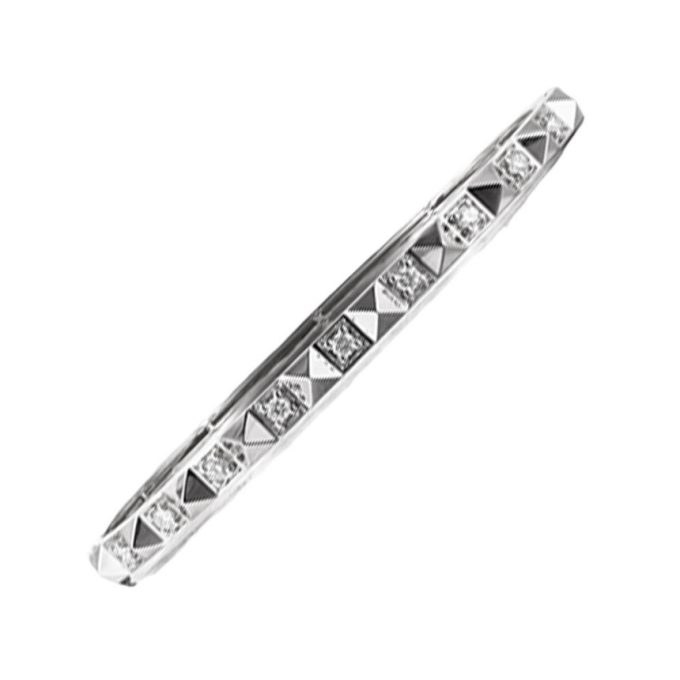 This contemporary bangle features a spike pattern with 0.37ctw of 14K white gold, perfect for any modern fashionista.