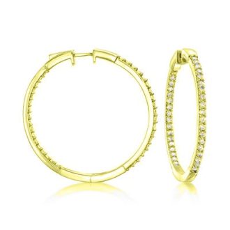 These radiant earrings are crafted of genuine 10-karat yellow gold and feature dazzling round diamonds totaling 1 carat. Designed with prongs inside and out, these stylish huggie hoop earrings display stunning sparkle from every angle. Securely fitting the earlobe, they refresh a traditional look with a modern twist. Perfect accessory to elevate any outfit.