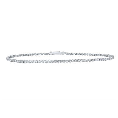 Feel luxurious with this stunning bracelet featuring round-cut diamonds measuring 1 1/5 carat total weight. Its micro tennis design delivers an exquisite sheen on an intricately detailed 10 karat white gold setting. Perfect for adding sparkle to your everyday attire or special occasions.