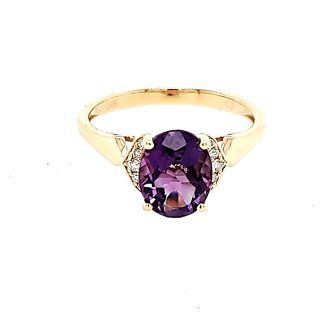 Fashion Ring with Oval Amethyst and .06ctw Round Diamonds in 14k Yellow Gold
