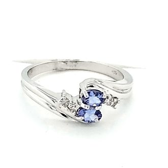 Fashion Ring with Oval Tanzanite and .06ctw Round Diamonds in 14k White Gold