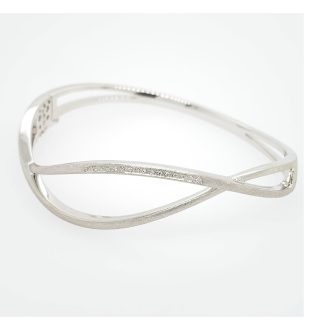 Experience elegance with this intricately designed bracelet featuring a unique open twist style, handcrafted in brushed stainless steel. Embellished with stunning white sapphire stones, its sleek design lends a contemporary edge to any look. This bangle is not just an accessory but a statement piece, capturing the eye with its subtle sparkle.