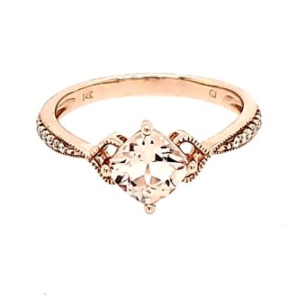 A beautiful 14k rose gold milgrain heart side detail fashion ring with 0.06ctw of diamonds.