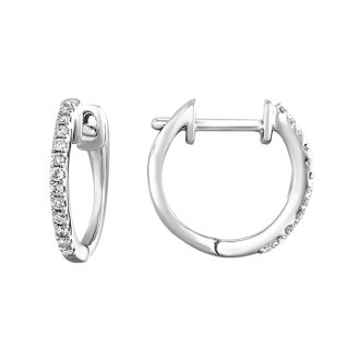 A Classic Pair Of Huggie Hoops With 0.10 Carat Diamonds Set In 10k White Gold. Perfect For Everyday Wear.