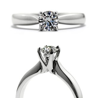 This exquisite 18K white gold Serenity engagement ring boasts an alluring sense of tranquility. Highlighted by a radiant cut, Heart of Fire diamond weighing 0.36 carats, it emits a brilliant tapestry of light. Selectively picked with an immaculate graded qualities a G and VS2, it promises an infinitive shimmer situated at the crescendo of elegance.