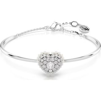 Elegantly adorn your wrist with this rhodium-plated bangle. Exuding sophistication, the dazzling design showcases a stunning, heart-shaped centerpiece, complemented by the beautiful simplicity of a white hue. Carefully infused with the natural curves of a hyperbola, this unique piece will effortlessly elevate your style, adding a touch of timeless glamour to any ensemble.