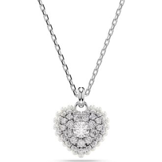 This beautiful heart-shaped pendant offers a modern hyperbola design, crafted to perfection. With its bright, white sparkling crystals, it captures light splendidly. Highlighted with rhodium plating, this piece exudes timeless style and sophistication. Wear it solo or layer it to match your unique fashion sense. A radiant jewelry piece that promises to add a dazzling touch.