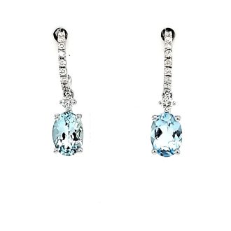 Fashion Earrings with Oval Aquamarine and .20ctw Round Diamonds in 14k White Gold