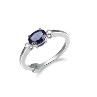 This luxurious piece radiates beauty with its lab-made oval sapphire centerpiece. Enhanced by large dazzling diamonds, tested at H-I color and I1 clarity, this jewelry item weighs a total of 3 points. Structured into a rhodium-treated sterling silver setting, it adds sophistication with long-lasting brilliance that merges quality and affordability in a precious keepsake.