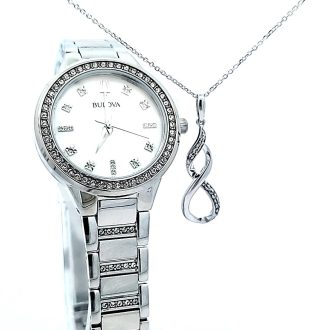 This elegant ensemble is composed of striking stainless steel jewelry, featuring a glamorous Infinity pendant. Accented with sparkling crystals for eye-catching appeal, presented in a beautiful box set. An ideal gift for trend-conscious ladies seeking a timeless piece of radiance in their collection.