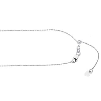 This graceful necklace features a finely crafted 1.02MM round wheat chain made from striking 10karat white gold. Covering 22 inches, the chain has an adjustable length to suit various styles. To ensure securewear, a sturdy lobster clasp is attached. Make a quiet but lasting statement of opulence with this hand-finished jewelry piece.
