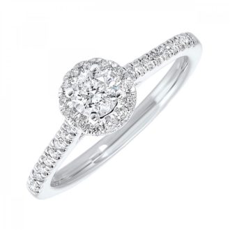 Featuring a flawless 0.53 carat round diamond at its heart, this sumptuous engagement ring exudes romance and sophistication. Encircled by a divine halo, the stone radiates opulence. Beautifully crafted in 14 karat white gold, the ring possesses a timeless elegance and delivers an enduring declaration of love.