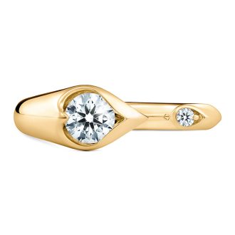 This opulent ring features a dual round Hearts of Fire diamond center, weighing a total of .56 carats. Expertly set in 18 karat yellow gold, the ring showcases a unique, open droplet fashion design. The luminous structure adds a sophisticated touch, making the ring a simple yet elegant style statement. Serial number for this exclusive piece is J1487044-01.