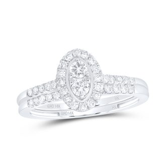 This exquisite bridal ring set showcases a fabulous oval-cut diamond encircled by a stunning halo of round diamonds. Accented with a 1/2 carat total weight of glistening diamonds, the set is crafted in stunning 14-karat white gold for the utmost shine and brilliance. An epitome of classic elegance and timeless style.