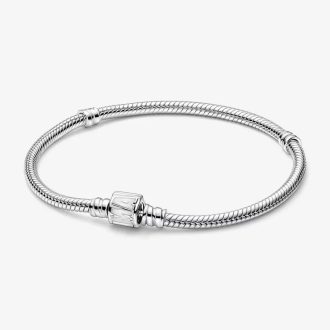 An intricate sterling silver snake chain bracelet with an elegant Marvel clasp that adds a touch of sparkle.