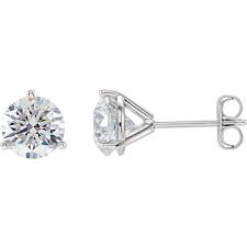 Picture dazzling white gold stud earrings set with almost a full carat of round H-level color, SI2-I grade clarity diamonds. Designed with a sturdy three-prong setting to ensure your stunning stones stay in place. This radiant pair adds a touch of sophistication and glamour to any look.