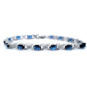 Pre-Owned Sterling Silver Oval Synthetic Sapphire Tennis Bracelet