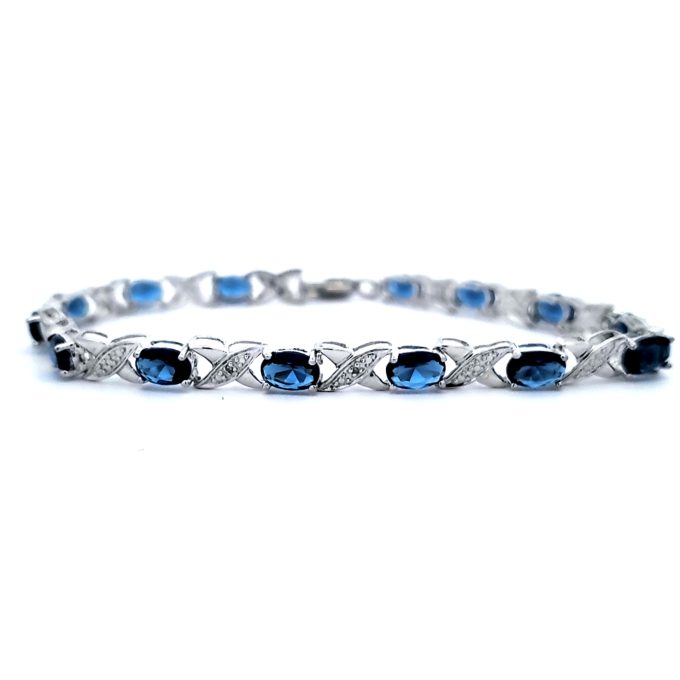 Pre-Owned Sterling Silver Oval Synthetic Sapphire Tennis Bracelet