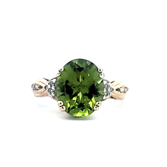 Pre-Owned 14K Yellow Gold Ring with Oval Peridot and 0.08CTW Diamonds