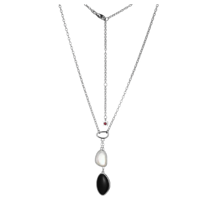 Stylish "Pebble" pendant features black agate and mother of pearl on a 17" rolo chain with a 3" extension. Perfect for a chic, layered look.