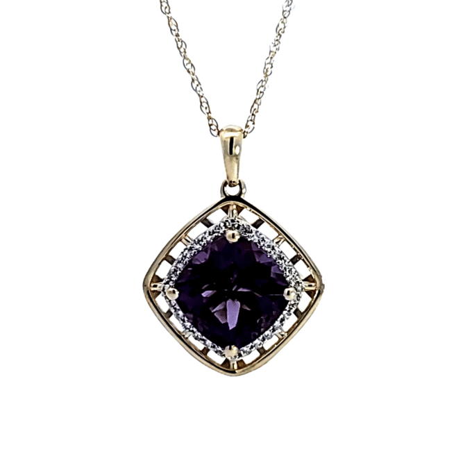 Halo Drop Pendant with .10ctw Round and Cushion Cut Diamonds in 10k Yellow Gold