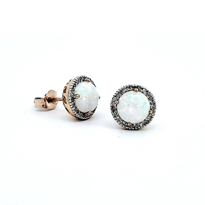 Opal and Diamond Halo Stud Earrings in 10k White Gold with .14ctw