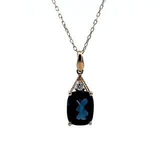 Elegant Blue Topaz Drop Pendant Necklace with .04ctw Round Diamonds in 14k Yellow Gold