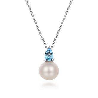 Sterling Silver Necklace with Blue Topaz and Mother of Pearl Pendant