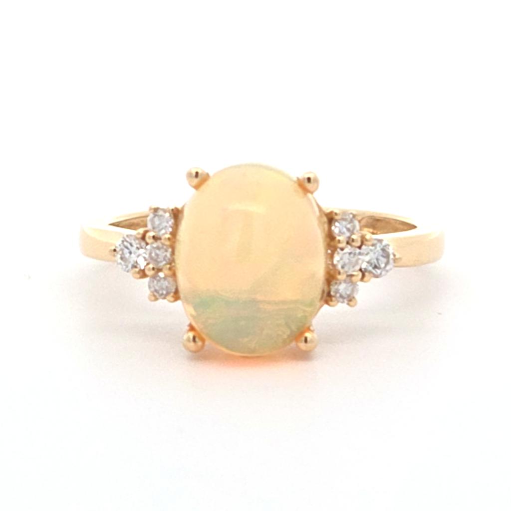 Oval Ethiopian Opal & .16ctw Diamond Ring in 14K Yellow Gold